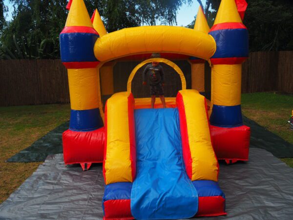 Castle with slide kicks n giggles party hire equipment waiuku kicks and giggles bouncy castles auckland